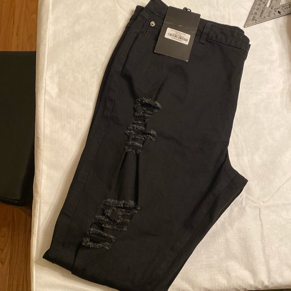 New with tags R.I.P. SLASH JEANS XXL